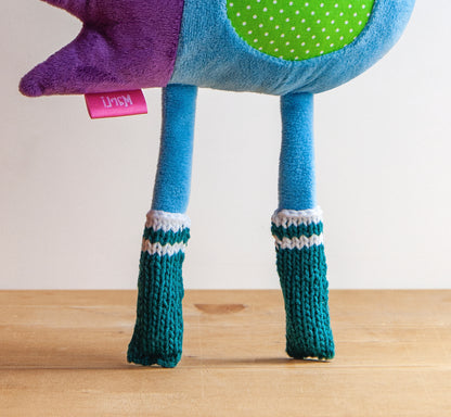 Plush Hedgehog in the knitted socks